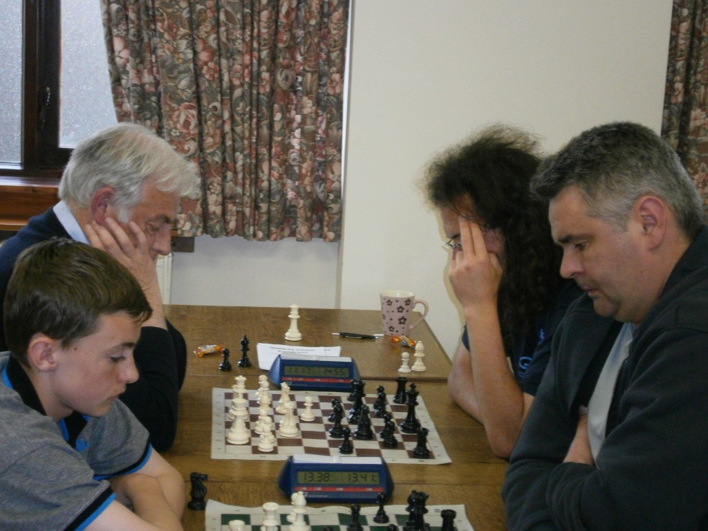 Four players deep in thought